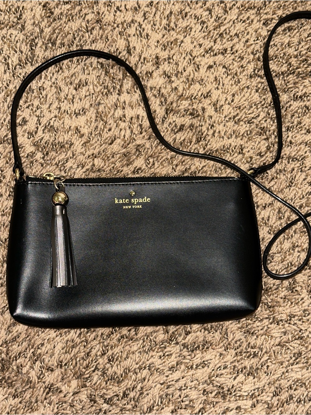 kate spade Black Leather Crossbody with Tassel Charm